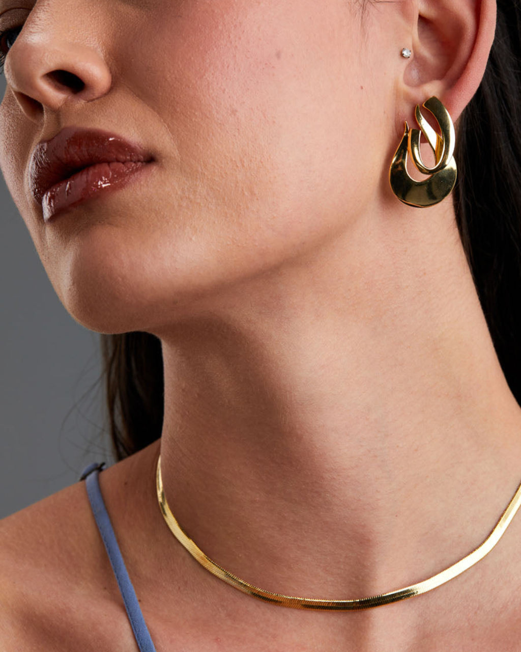 brinco-aberto-dourado-papoula-orbita-2