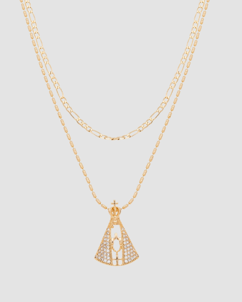 Colar duplo banhado a ouro 18k com corrente figaro, corrente bolinhas e pingente Nossa Senhora Aparecida com microzircônias — semijoia feminina Papoula
