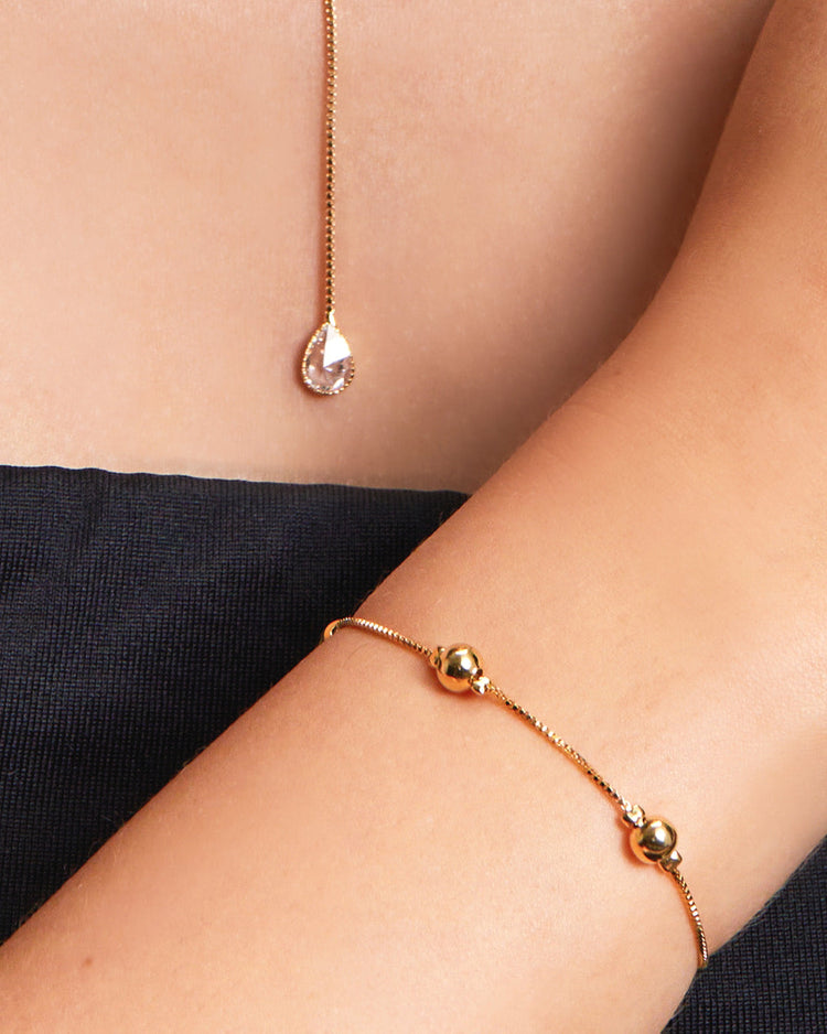 pulseira-ajustavel-3-bolas-dourada-papoula-pontos-de-luz-2