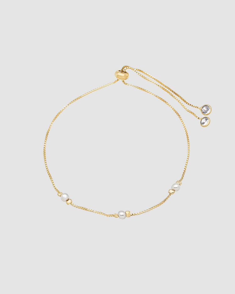 pulseira-perola-ajustavel-dourada-papoula-pontos-de-luz-1