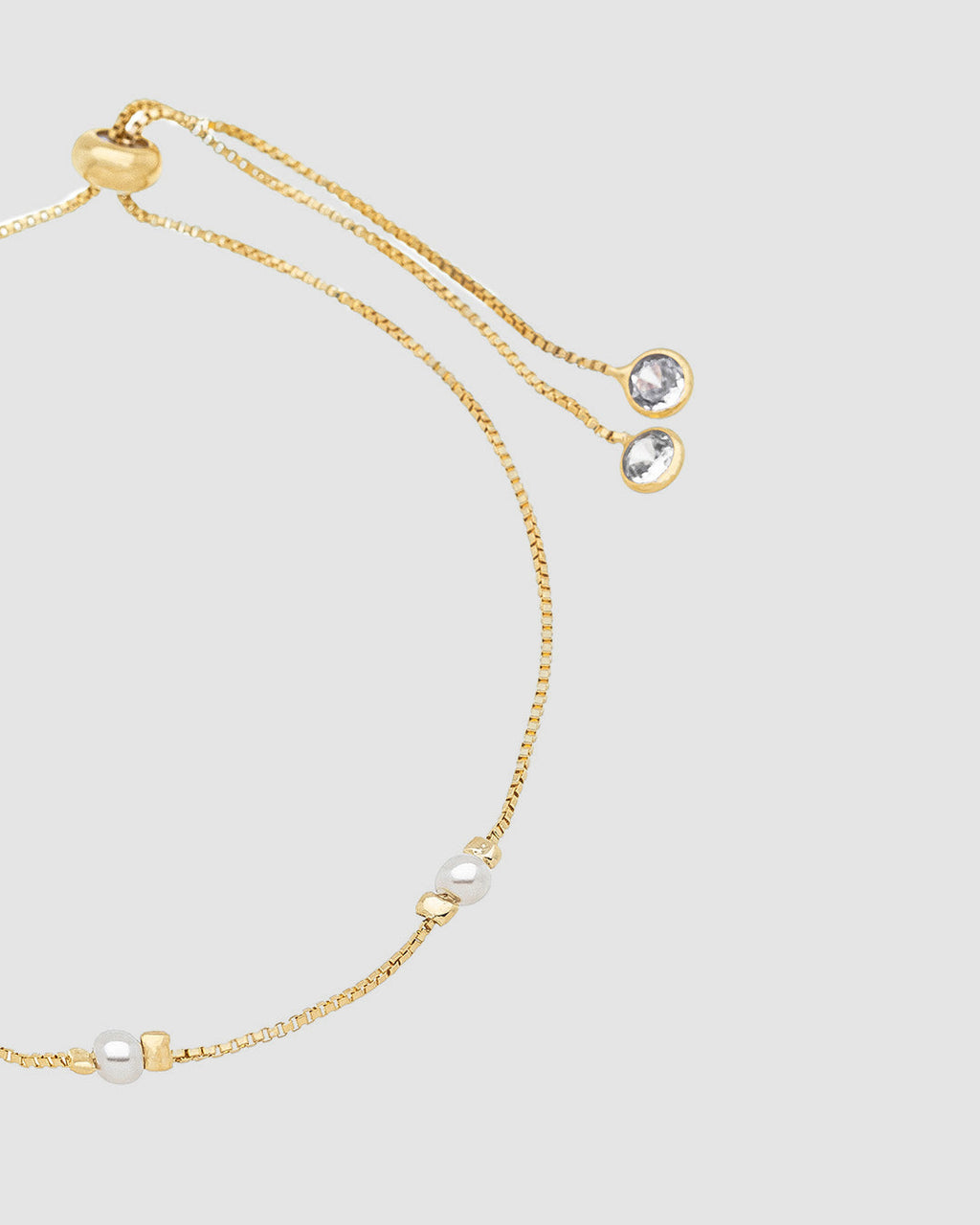 pulseira-perola-ajustavel-dourada-papoula-pontos-de-luz-3