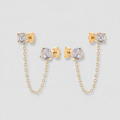 Brinco ear line corrente zircônia incolor semijoia banhado a ouro para dois furos — acessório feminino Papoula