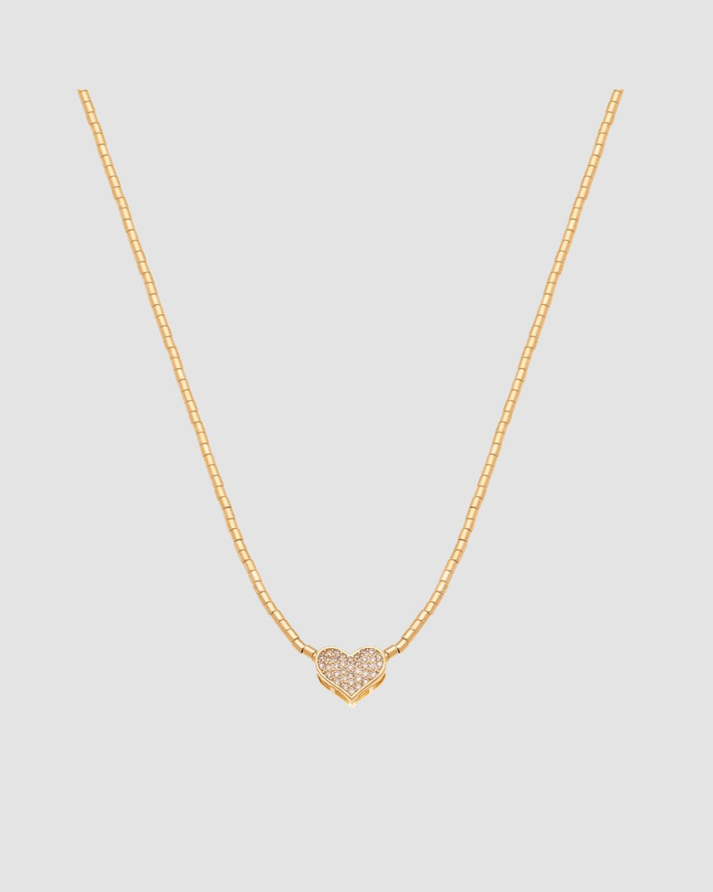 choker canutilho dourado Papoula, semijoia banhada a ouro 18k com pingente coração zirconia 1,2cm, 37cm + 10cm extensão com fecho ajustável, acabamento polido, fotografado em fundo cinza neutro