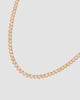 colar riviera dourado com zircônia Papoula, semijoia banhada a ouro 18k com zircônias brilhantes engastadas, 38cm de comprimento, acabamento polido brilhante, antialérgico para colo valorizado, fotografado em fundo cinza neutro