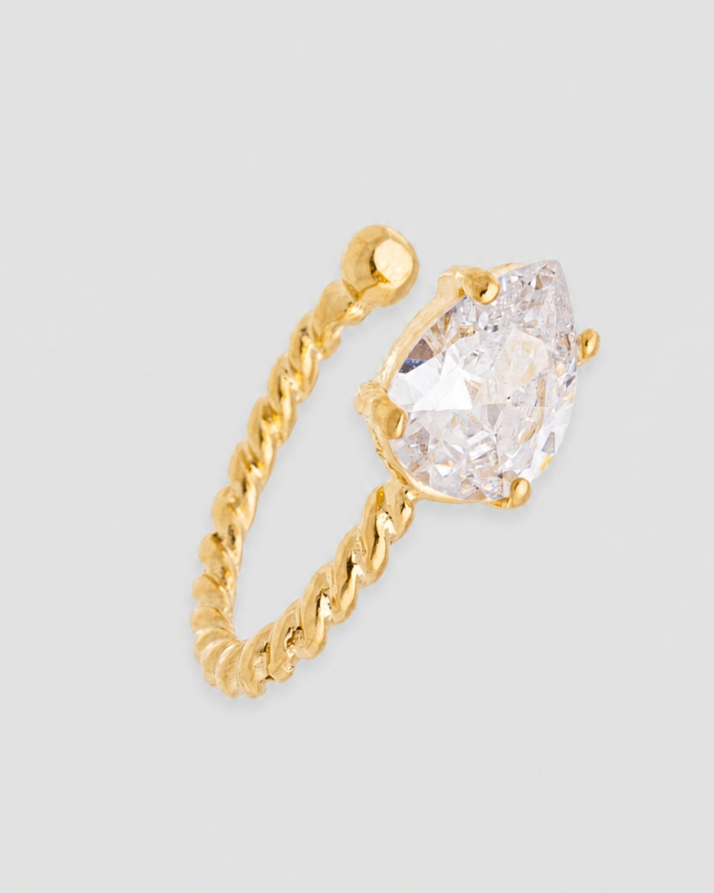 Piercing fake torcido zircônia gota semijoia banhado a ouro 0,6 cm — acessório feminino Papoula